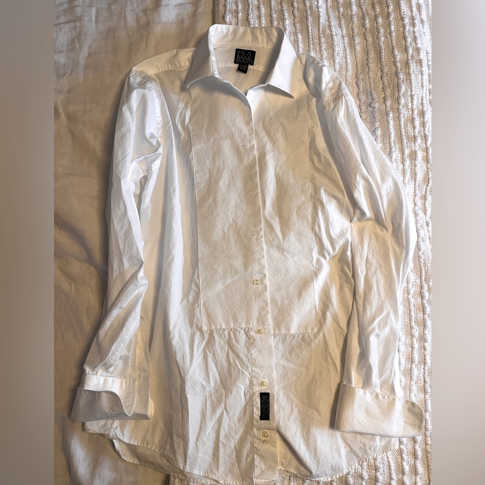 White mens tuxedo French cuff shirt.